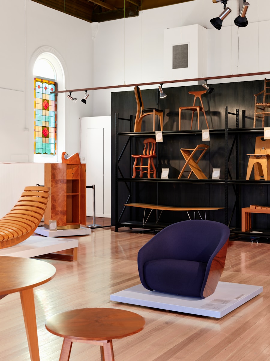 Modern furniture displayed in a museum exhibition hall.
