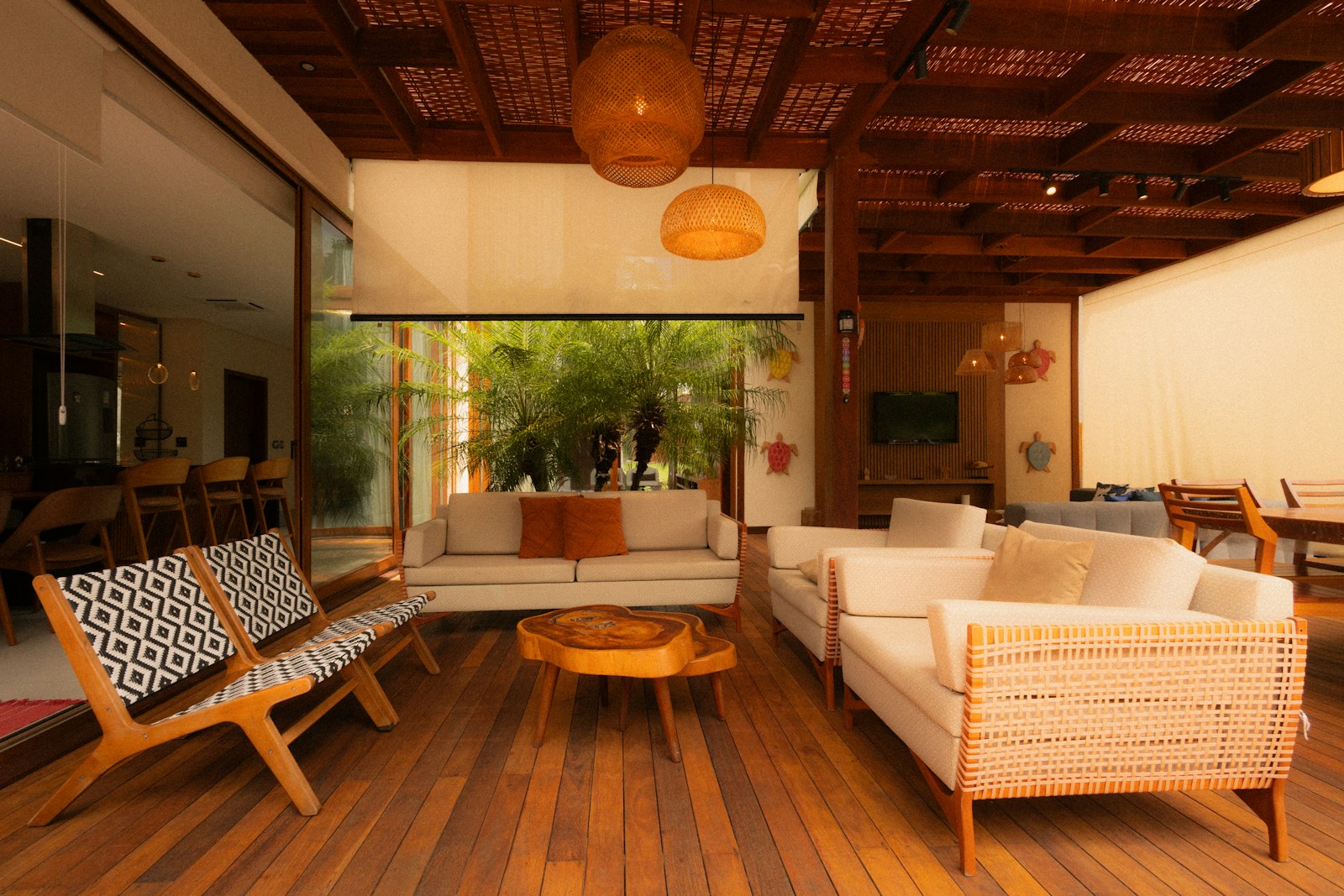 Modern living room with comfortable sofas and wooden flooring.